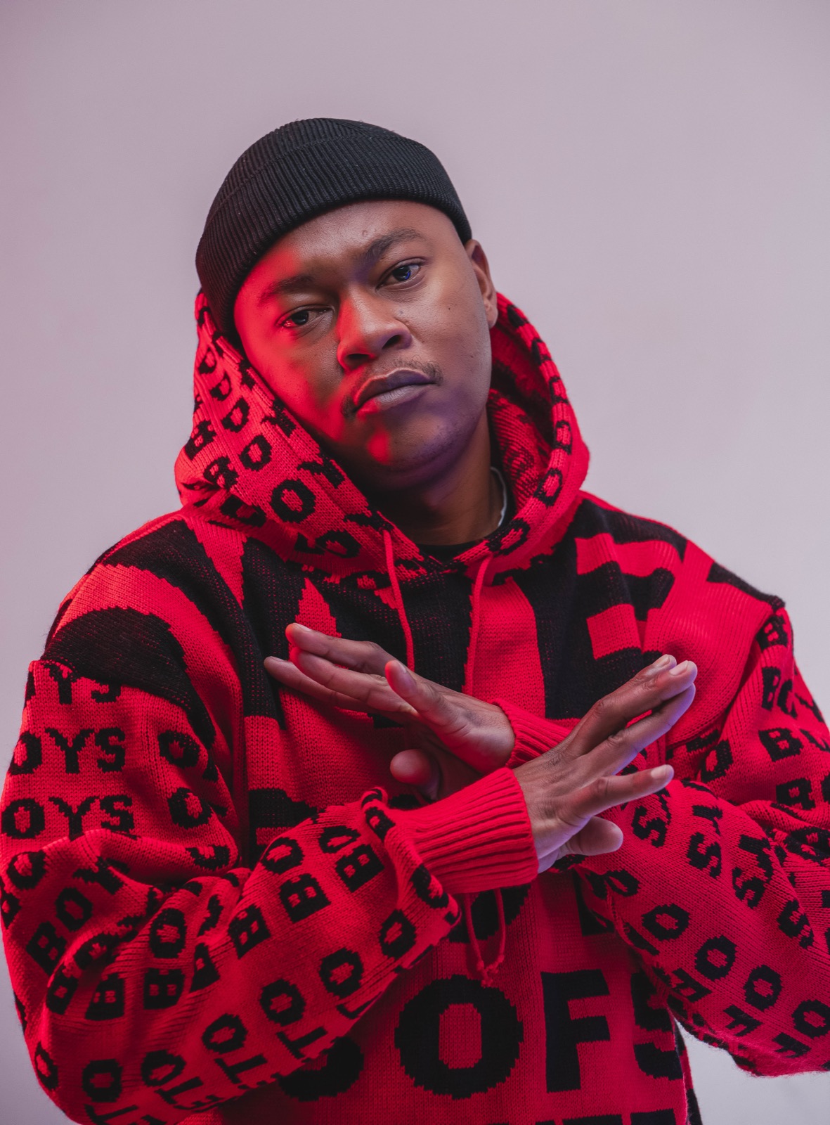 Mthizo in a red and black Boys of Soweto hoodie
